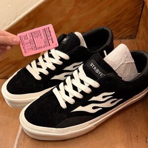 STRAYE Black Sneakers with White Flame Design